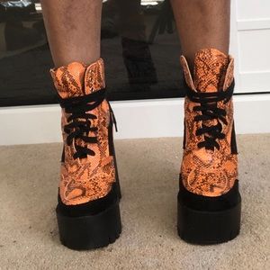 Neon orange snake skin and suede platform booties